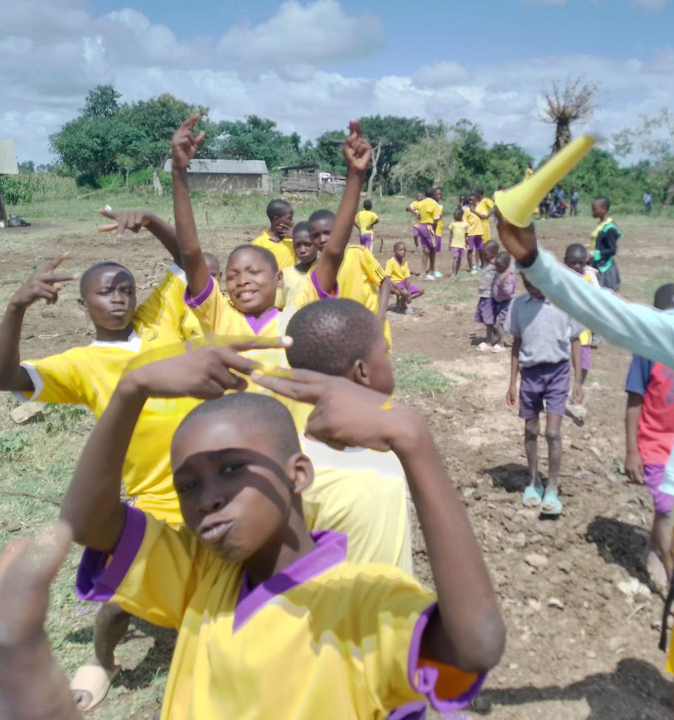 Children smiling and playing outdoors